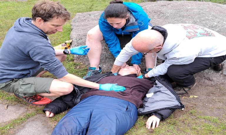 Supporting a casualty on an Outdoor First Aid course on Dartmoor, Devon